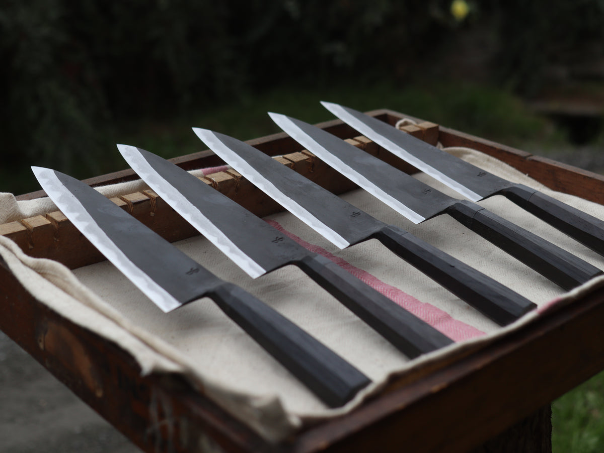 Integral bolster gyuto