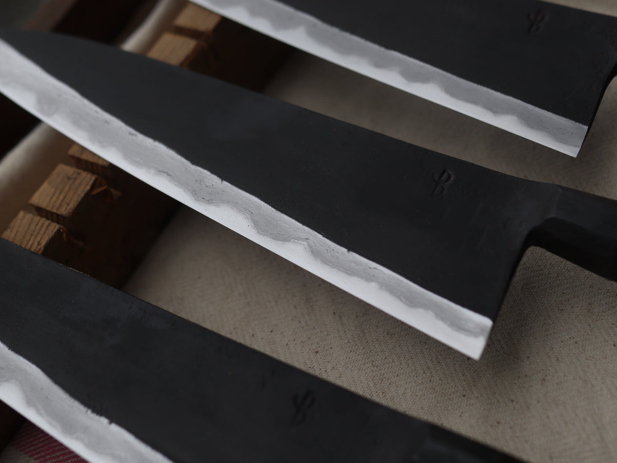 Integral bolster gyuto