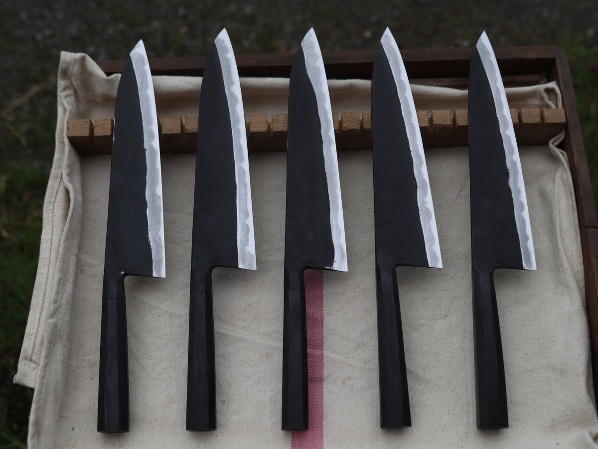 Integral bolster gyuto
